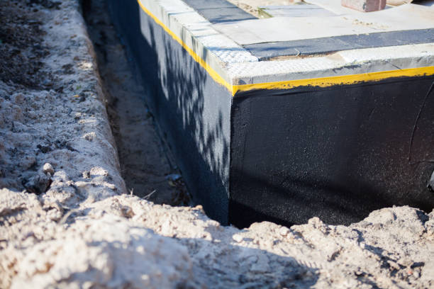 Professional Basement Waterproofing technician working in Princeton, NC